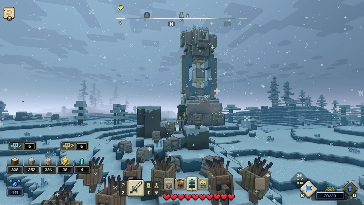 A hero followed by several plank and cobbestone golems facing a frost tower in a snowy landscape.