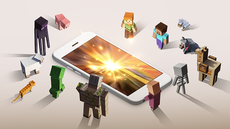 明るくなったスマホを見ている複数の Minecraft キャラクター