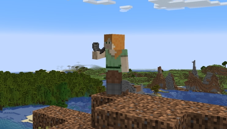 Alex is standing on top of a hill of dirt blocks. She's blowing in a goat horn. A mangrove swamp can be seen in the far distance.