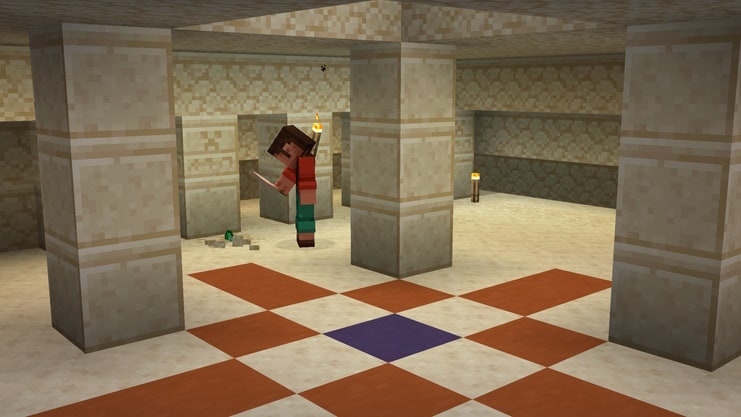 A player excavating an Emerald from some suspicious sand in a Desert Pyramid.