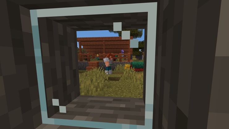 A view out a village house window of a player tempting a sniffer outside.